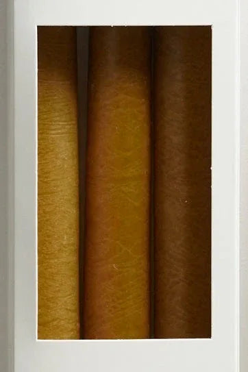 Intérieur d'une boite de 3 bougies longues